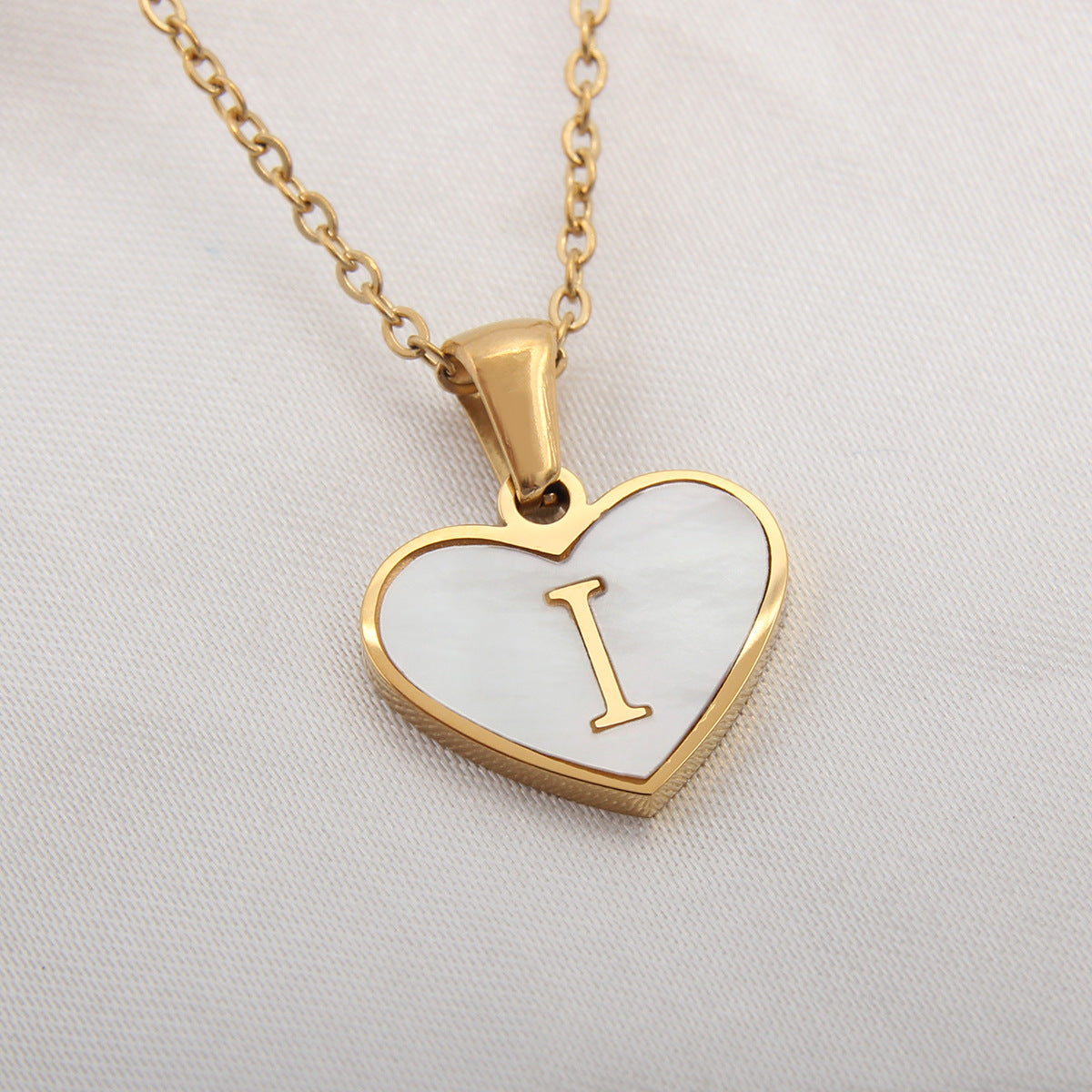 Sea Blue Mall Gold Plated Personalized Letter Heart-shaped Necklace with a White Shell  SeaBlueMall.com