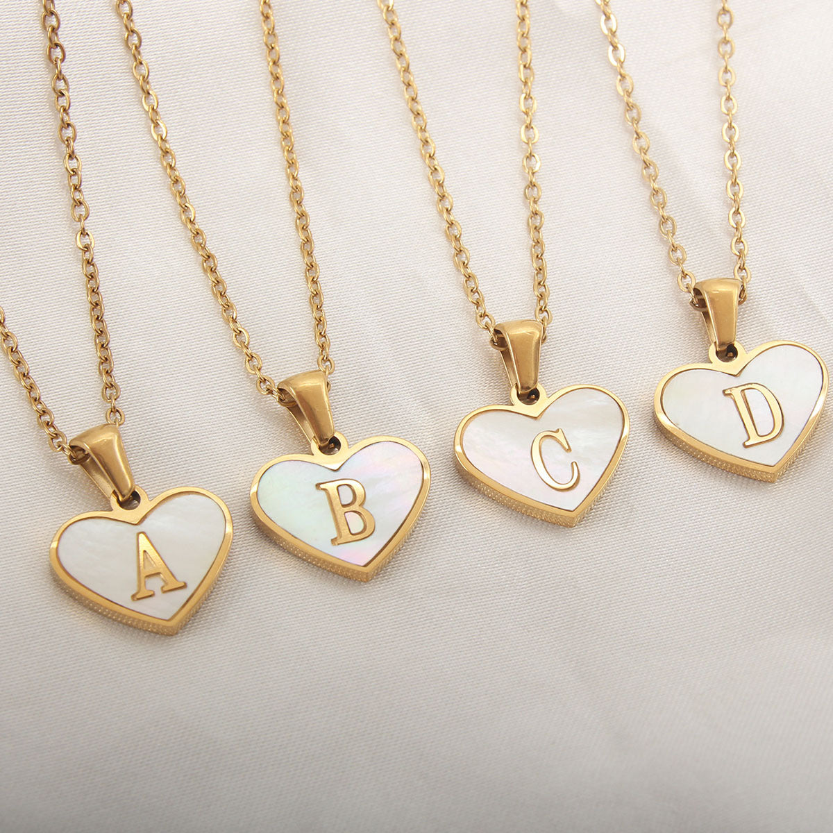 Sea Blue Mall Gold Plated Personalized Letter Heart-shaped Necklace with a White Shell  SeaBlueMall.com