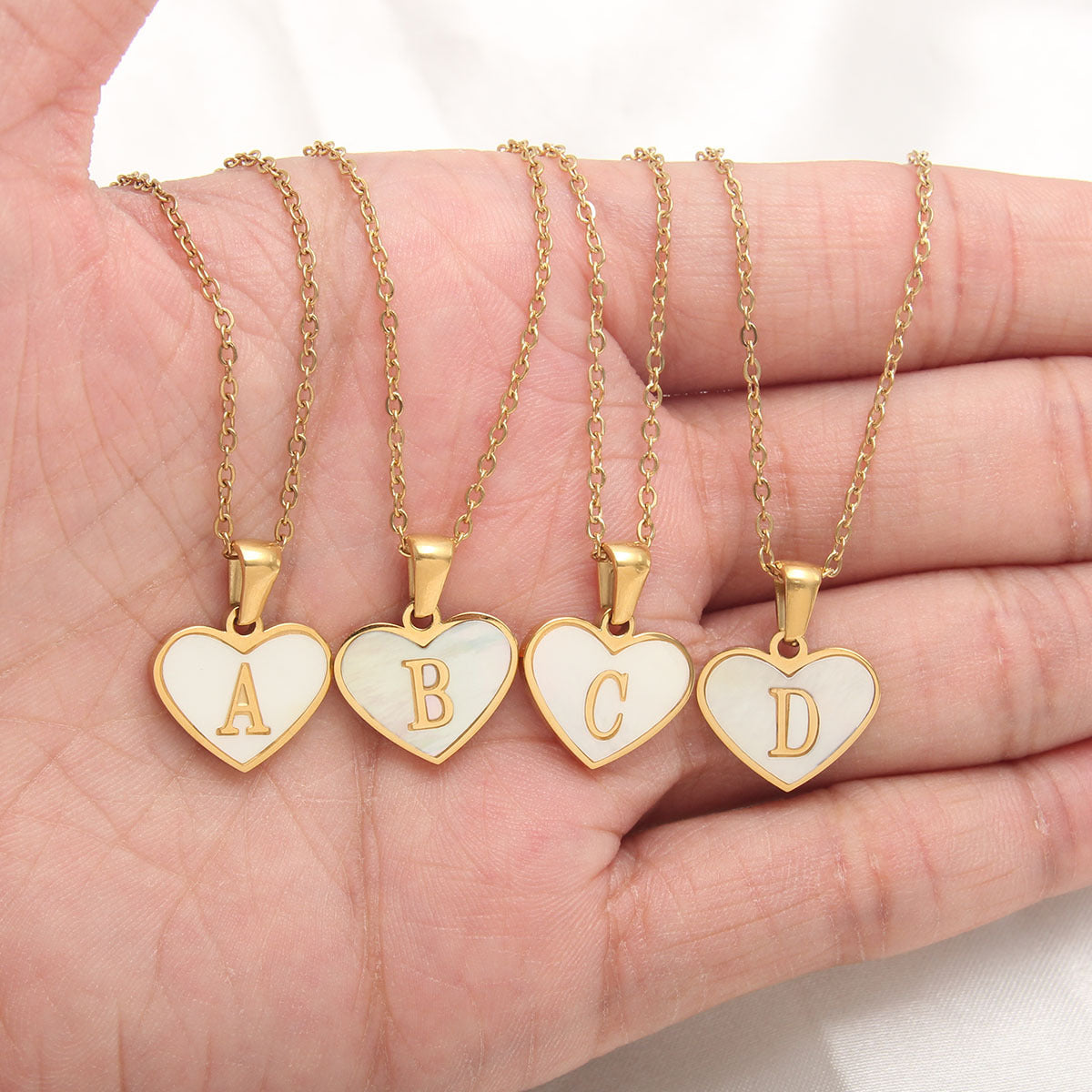 Sea Blue Mall Gold Plated Personalized Letter Heart-shaped Necklace with a White Shell  SeaBlueMall.com