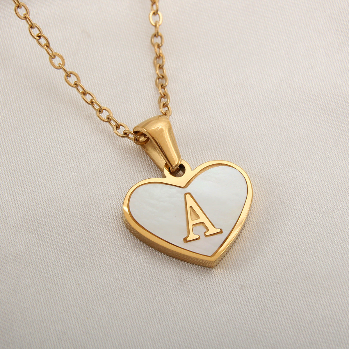 Sea Blue Mall Gold Plated Personalized Letter Heart-shaped Necklace with a White Shell  SeaBlueMall.com