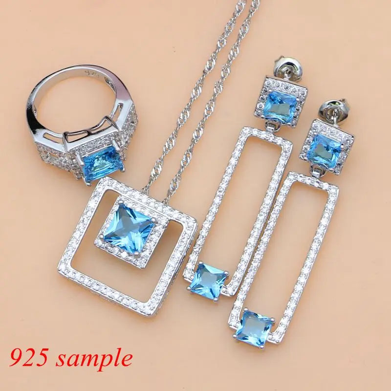 Royal Chic Blue Topaz 5 Pc. 925 Silver Jewelry Set - Necklace, Ring, Earrings, Bracelet.