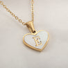 Sea Blue Mall Gold Plated Personalized Letter Heart-shaped Necklace with a White Shell  SeaBlueMall.com