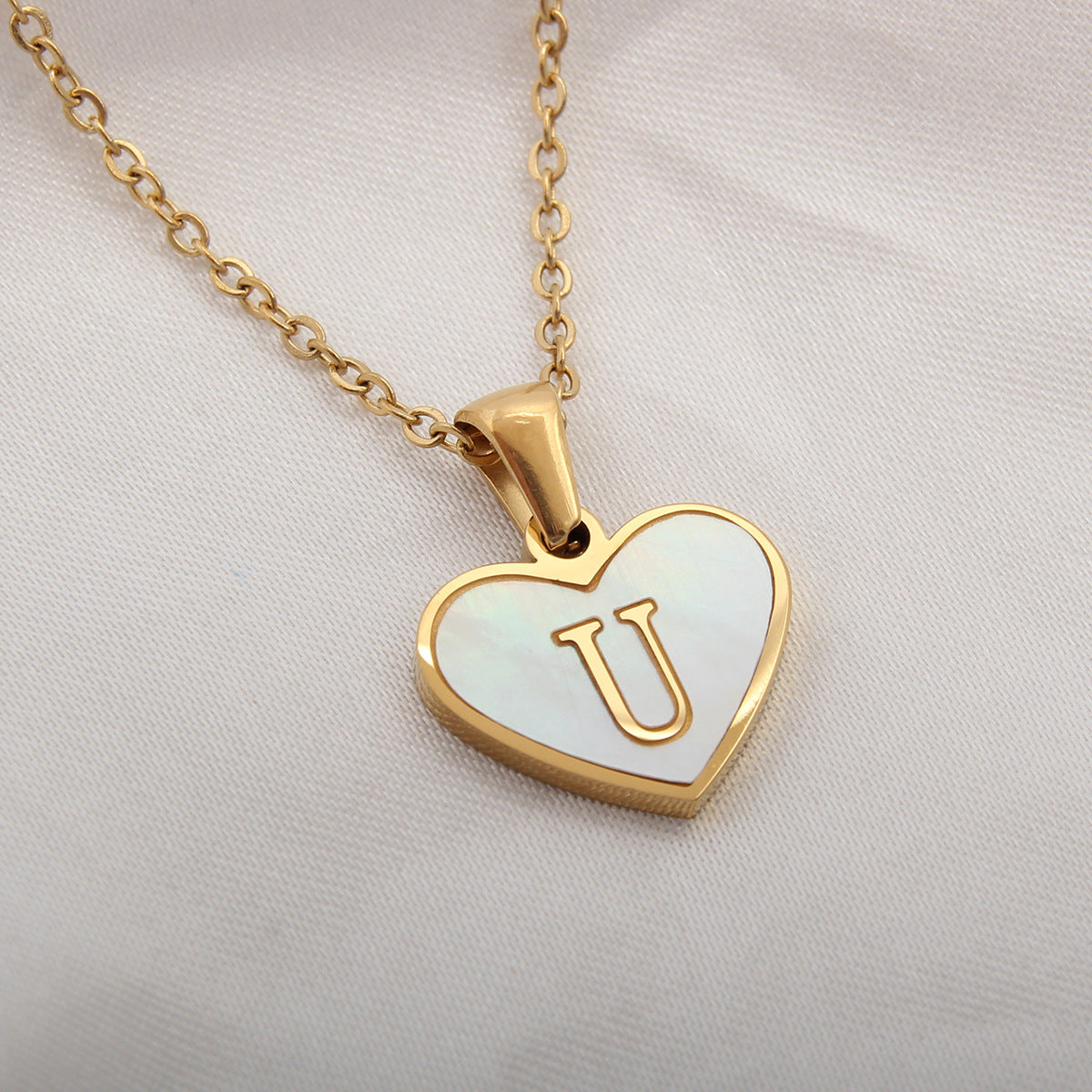 Sea Blue Mall Gold Plated Personalized Letter Heart-shaped Necklace with a White Shell  SeaBlueMall.com