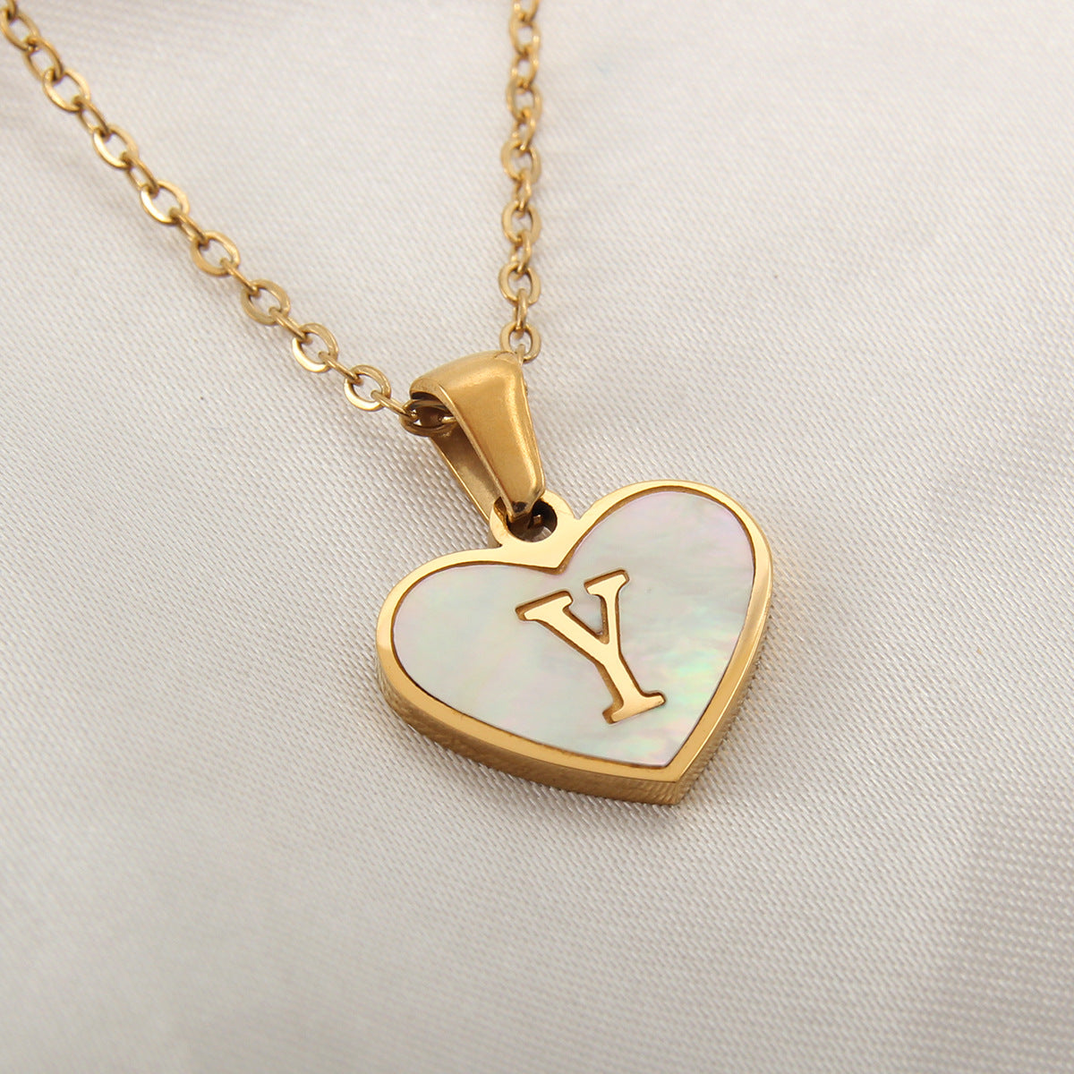 Sea Blue Mall Gold Plated Personalized Letter Heart-shaped Necklace with a White Shell  SeaBlueMall.com